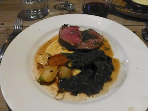 Lamb on polenta with spinach and turnips