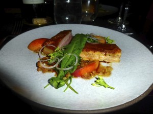 Suckling Pig with Peaches and Arugula--The Nomad